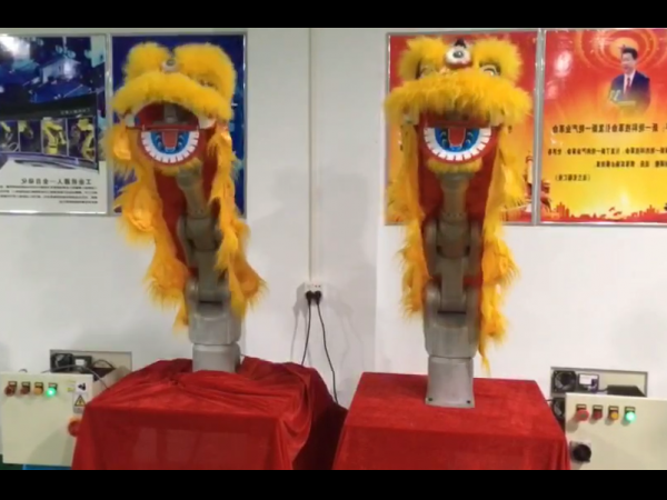 Robot arm lion dance performance